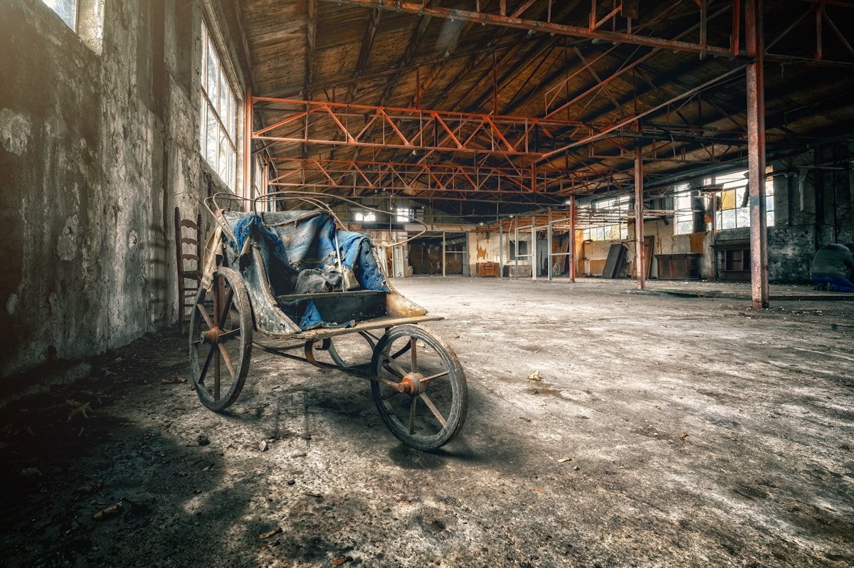 Industrial cleaning operatives in warehouse